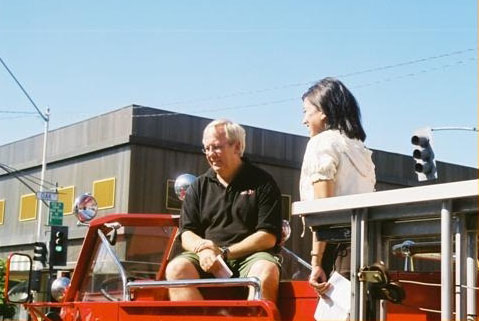 people sitting on a fire truck